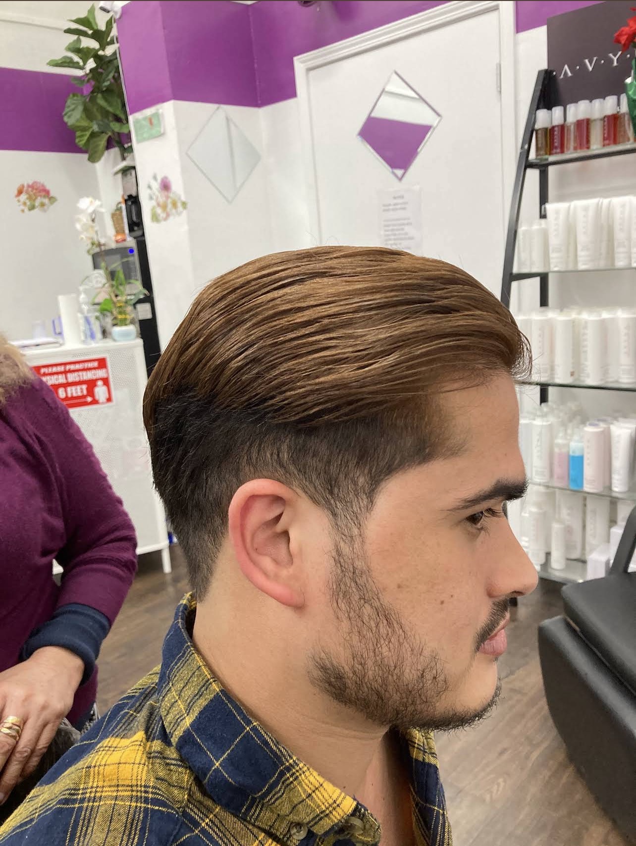 Men's tapered haircut and style at Golden Beauty Barbershop