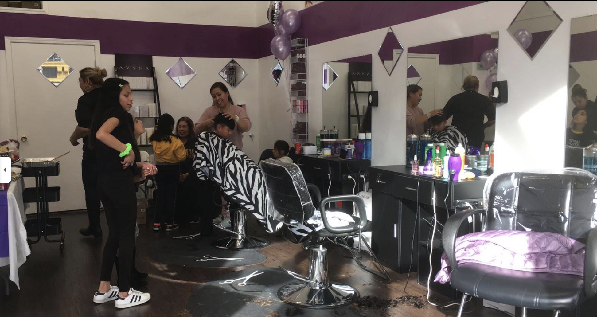 Team of barbers at Golden Beauty Barbershop