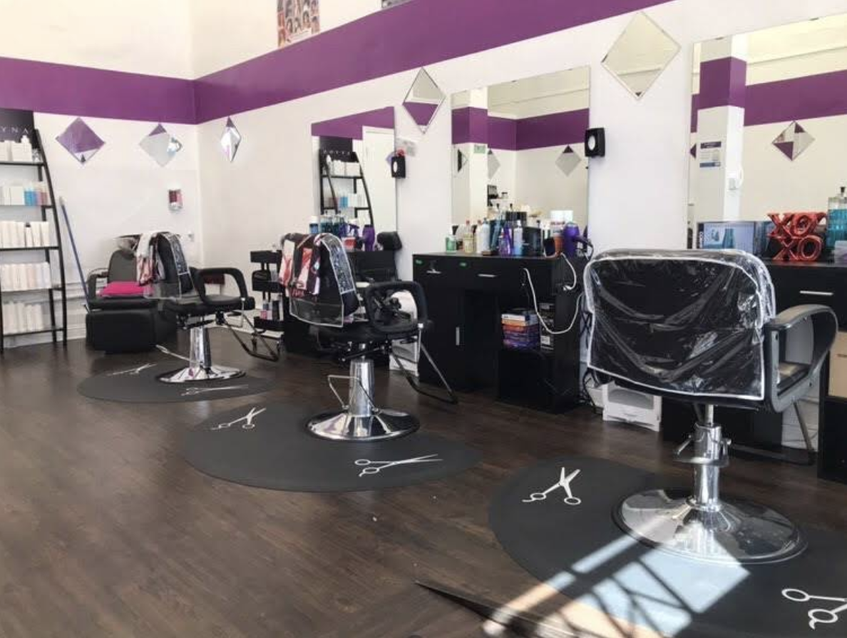 Barber stations with mirrors inside the shop
